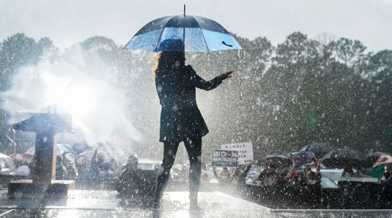 Watch: Kamala Harris dances in the rain