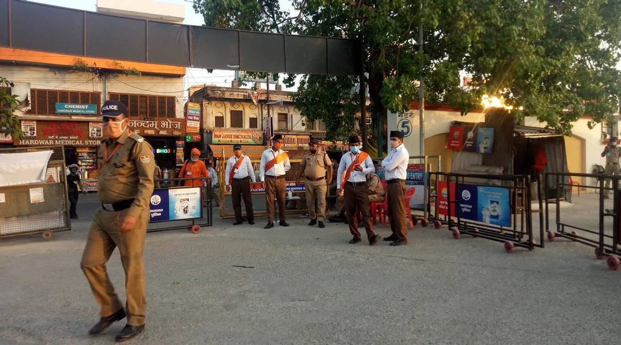 In Kumbh crowd management, a first: RSS workers as Special Police Officers