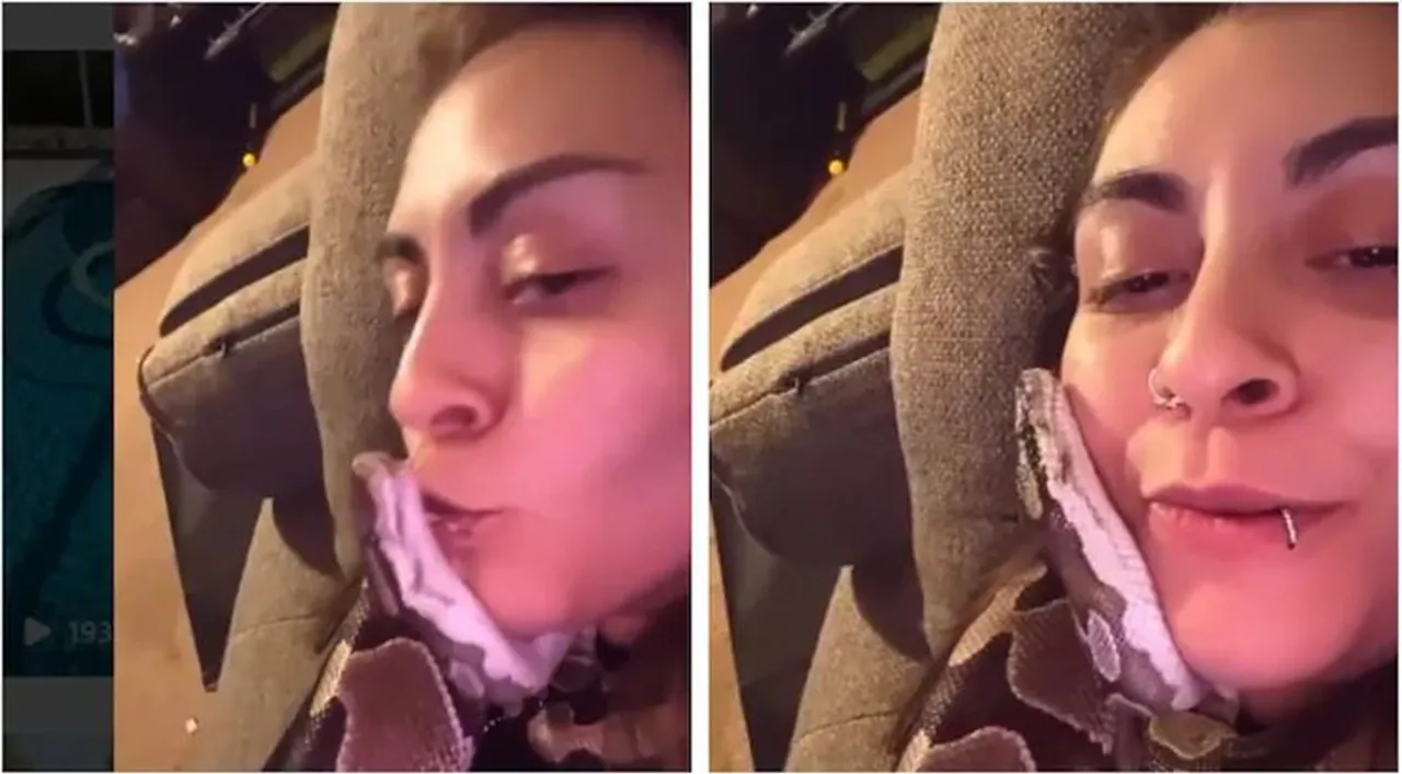 snake viral video, snakes viral videos, pet snakes, young woman kisses pet snake, viral video