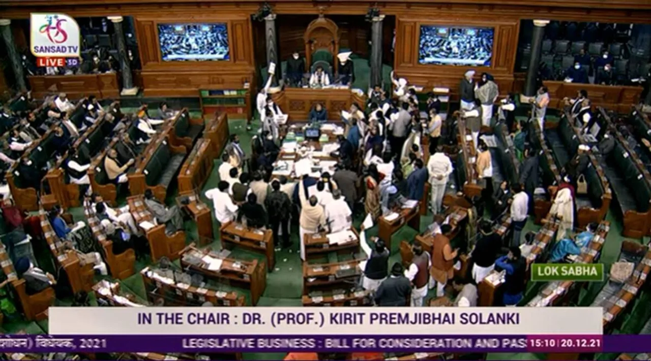 Voter ID Aadhaar card link bill passed in Lok Sabha, opposition protest, Election laws amendment 2021, வாக்காளர் அட்டை - ஆதாரை இணைக்கும் மசோதா, தேர்தல் சீர்திருத்த மசோதா மக்களவையில் நிறைவேற்றம், எதிர்க்கட்சிகள் எதிர்ப்பு, Lok Sabha, BJP, Congress, TMC, india