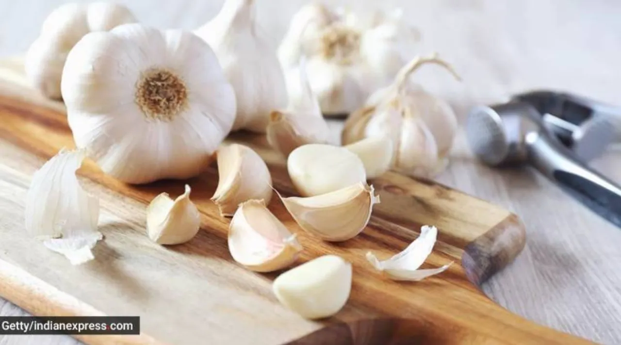 garlic, garlic benefits, health benefits, Tamil Indian Express, lifestyle, பூண்டின் நன்மைகள், பூண்டு, பூண்டு மருத்துவ குணங்கள், பூண்டு சாப்பிட்டால் என்ன நன்மை, cooked garlic, health, food, garlic benefits, garlic with warm water, garlic cloves