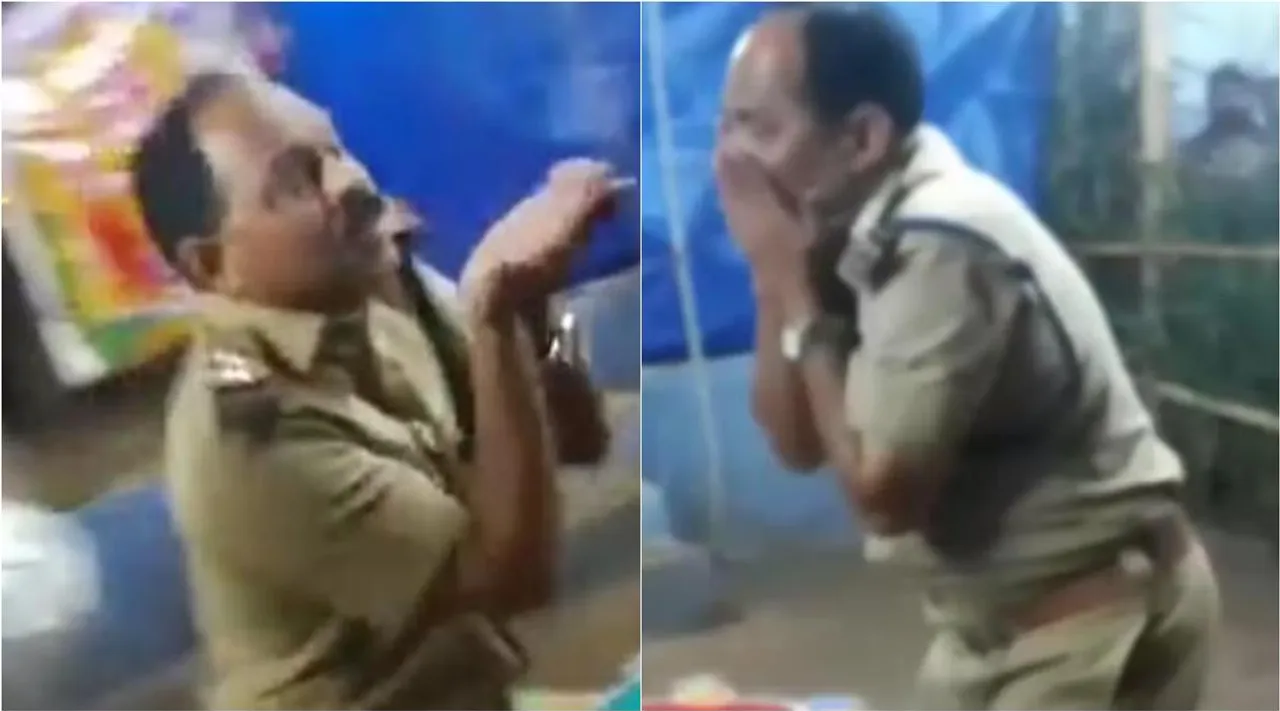 Kerala police dance for Tamil devotional song, kerala, idukki, keral police dance, 'மாரியம்மா... மாரியம்மா..!' கேரளாவில் தமிழ் பக்தி பாடலுக்கு டான்ஸ் ஆடிய எஸ்.ஐ பணி நீக்கம் - Kerala police si suspend for dance to Tamil devotional song video goes viral
