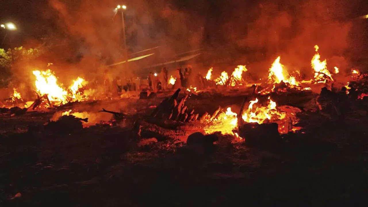 Numerous dead bodies being burnt as far as you can see in Delhi’s old Seemapuri Cremation Center-Delhi in the last 24 hours