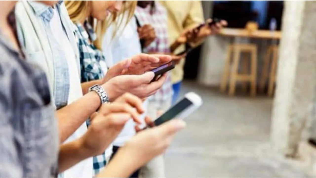 people using mobile phone