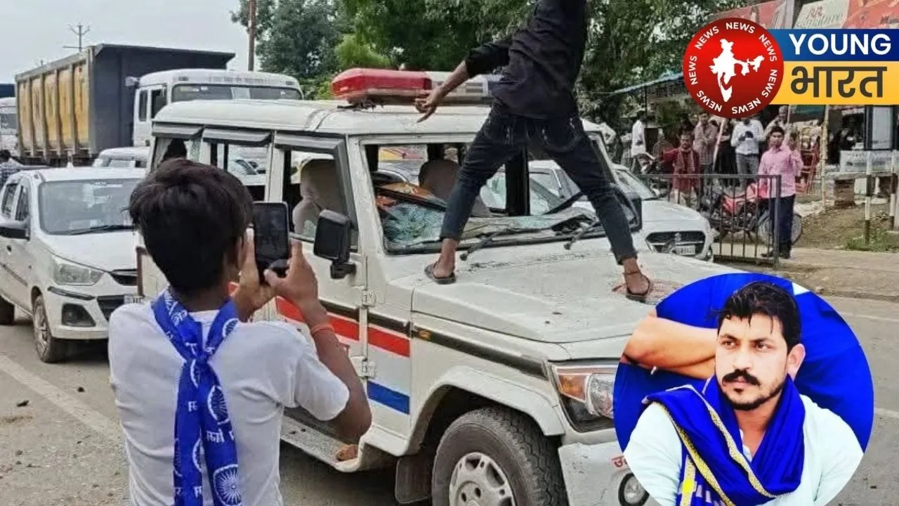 Rioters vandalizing police vehicle