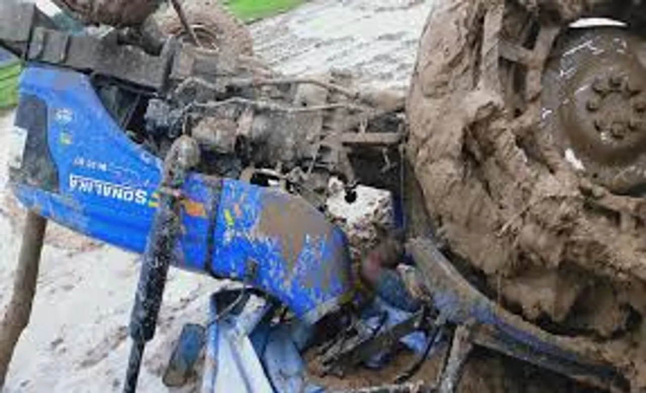 tractor overturns in mud