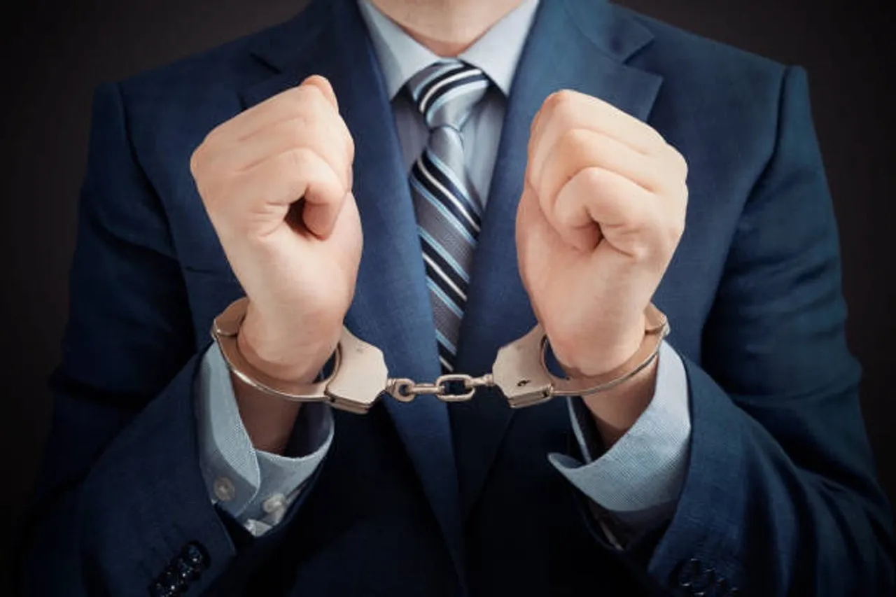 Businessman Behind Jail