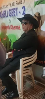 Mukesh Khanna sitting on multiple ( 03) chairs