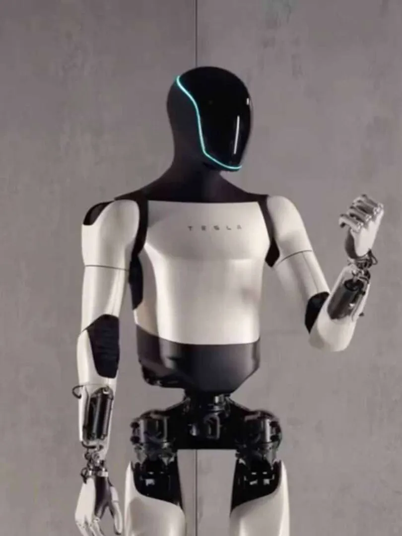 Tesla-Optimus-Designed-for-factory-and-warehouse-work,-intended-for-Tesla's-operations-and-preferred-partners.