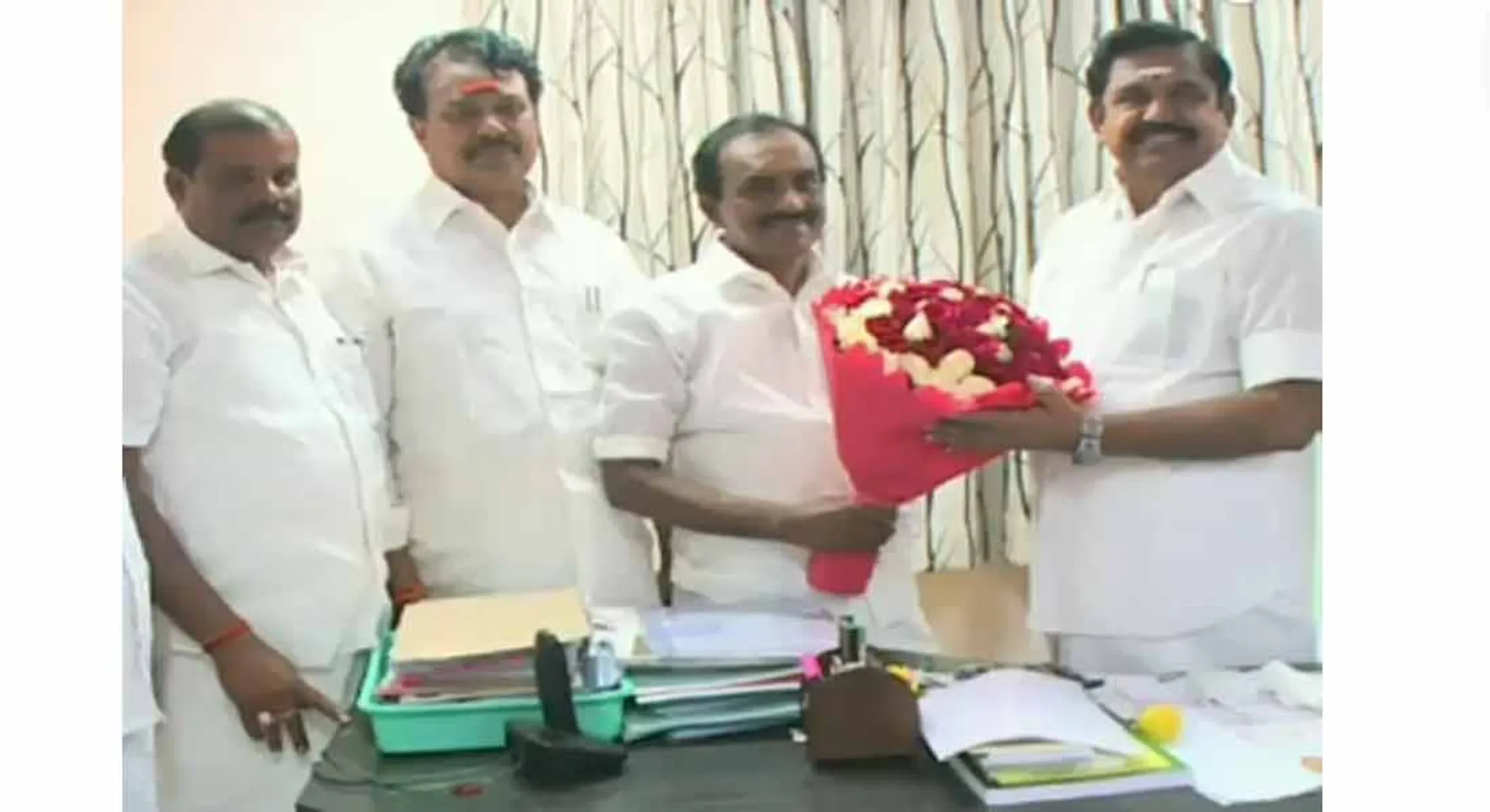Ammk district secretary re join with admk 