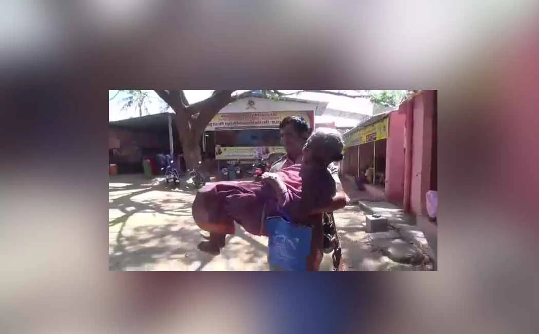 The soldier who helped to old lady to cast her vote  