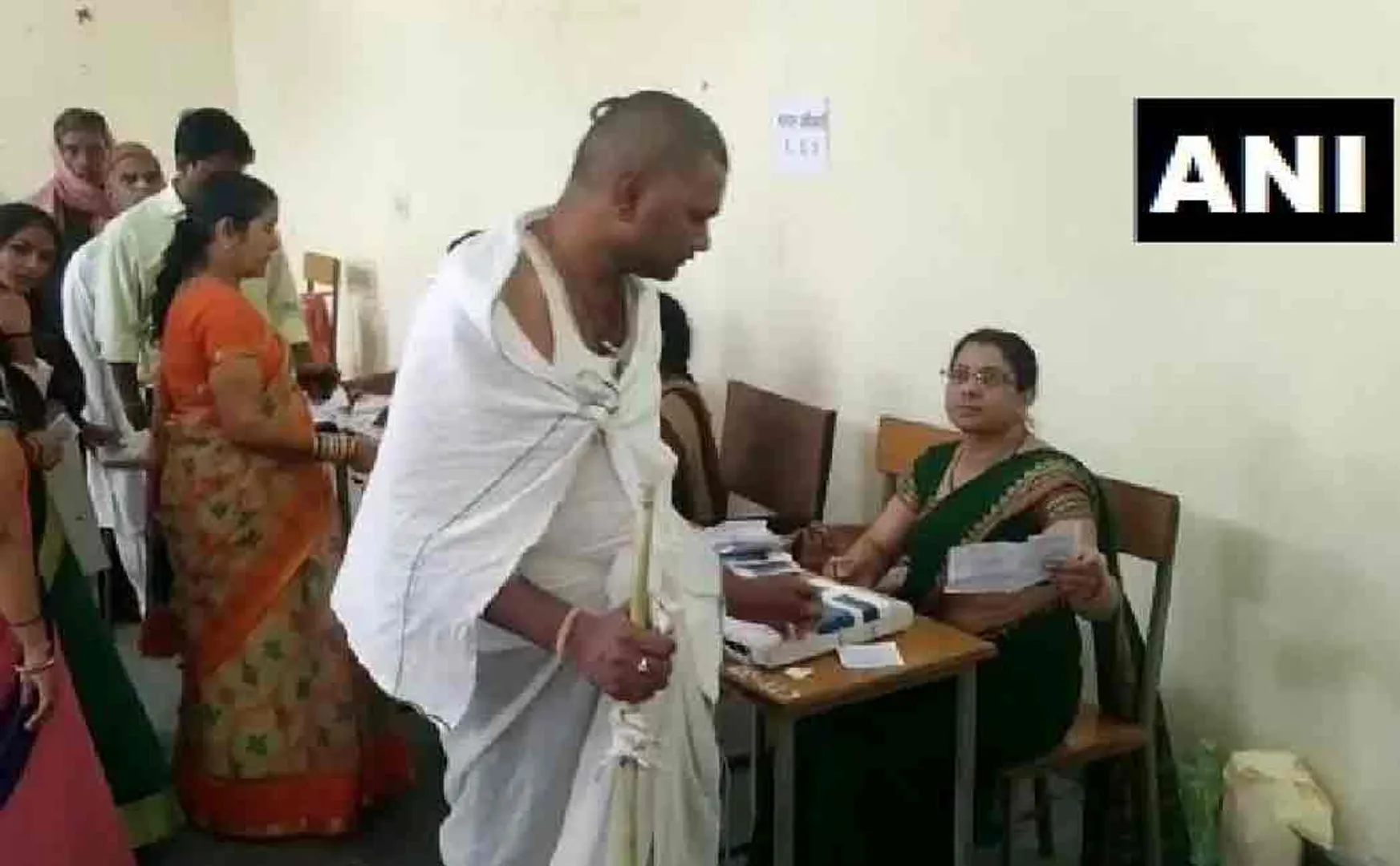 man cast his vote after finished his fathers funeral rituals