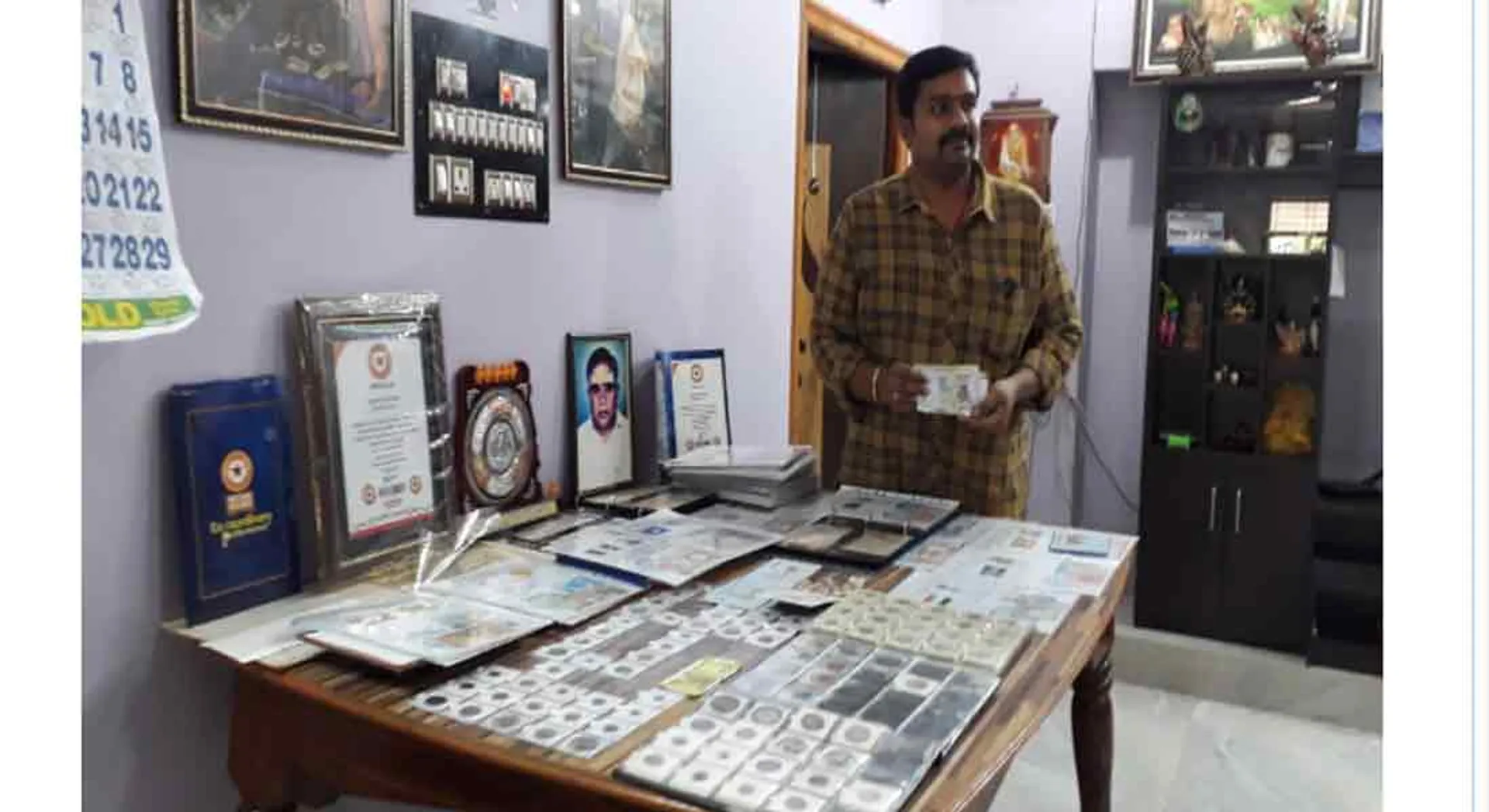  Coins of 200 countries including India ... Village youth who seek Guinness achievement!