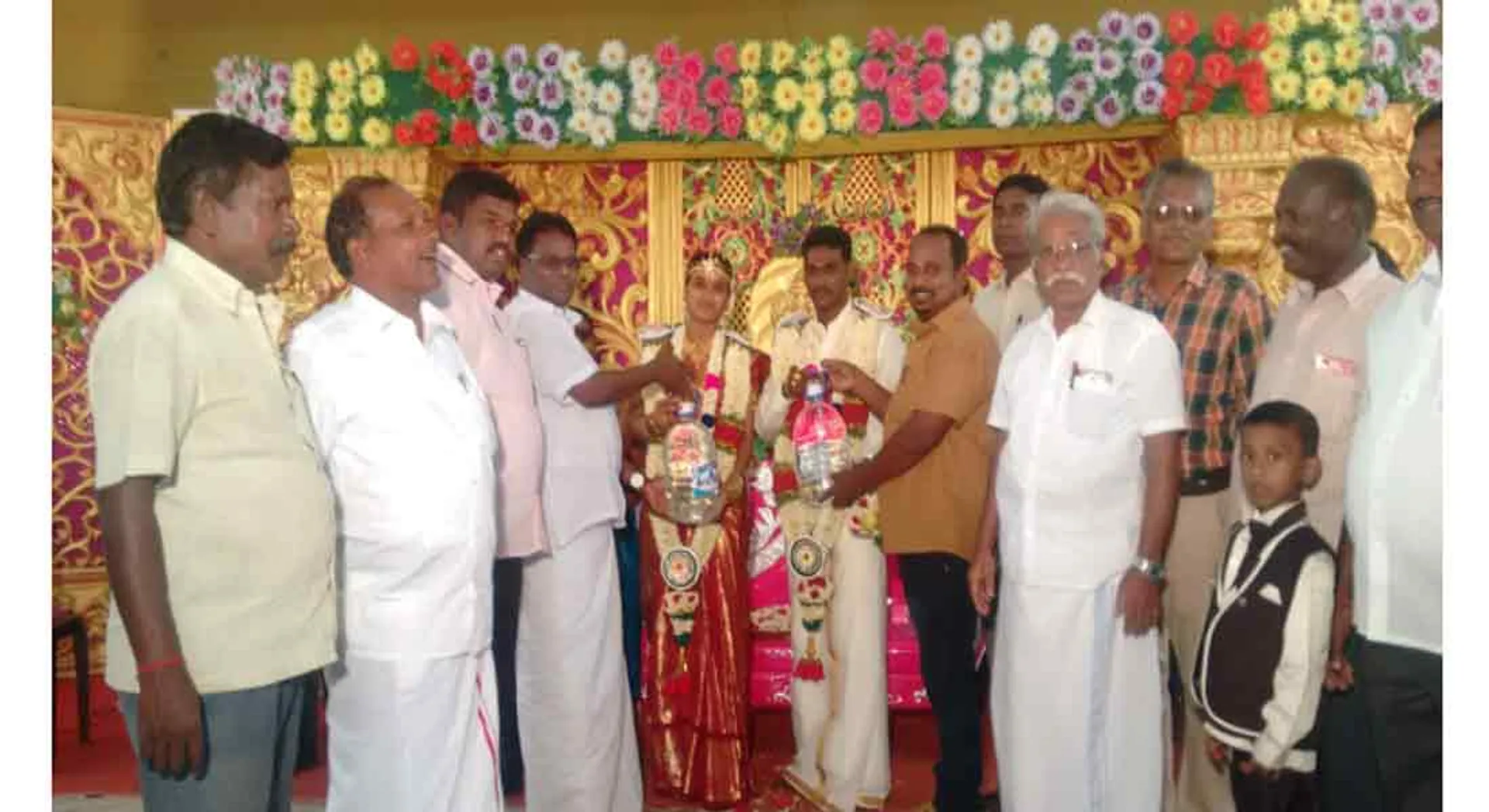 Communist comrades provided the water cans to  couples in Thiruvar