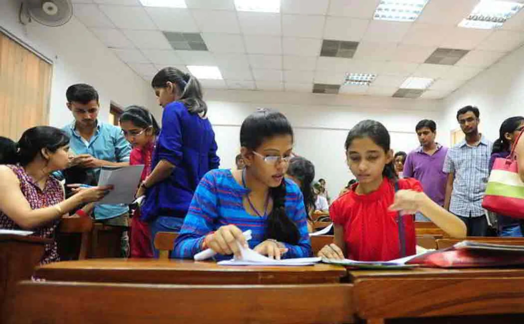 postal exams to be conducted only in english and hindi 