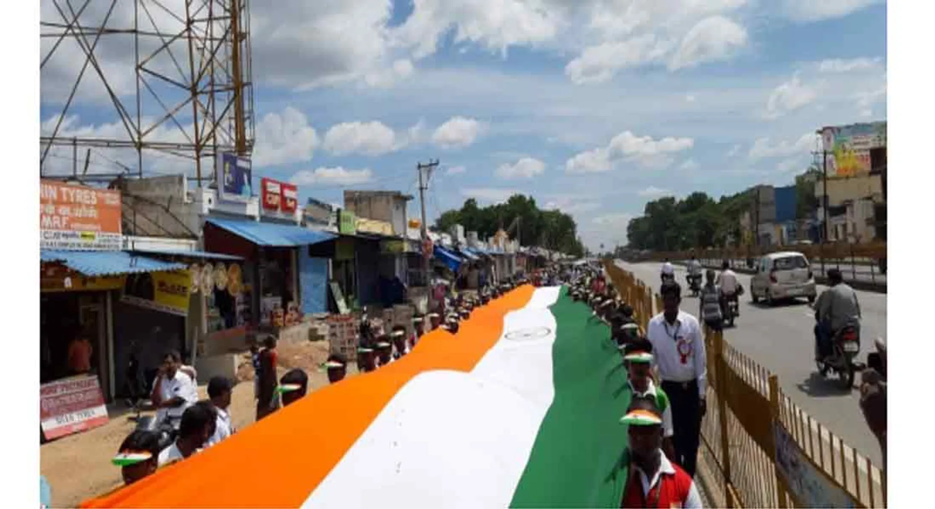 Students march with 150 feet long National Flag