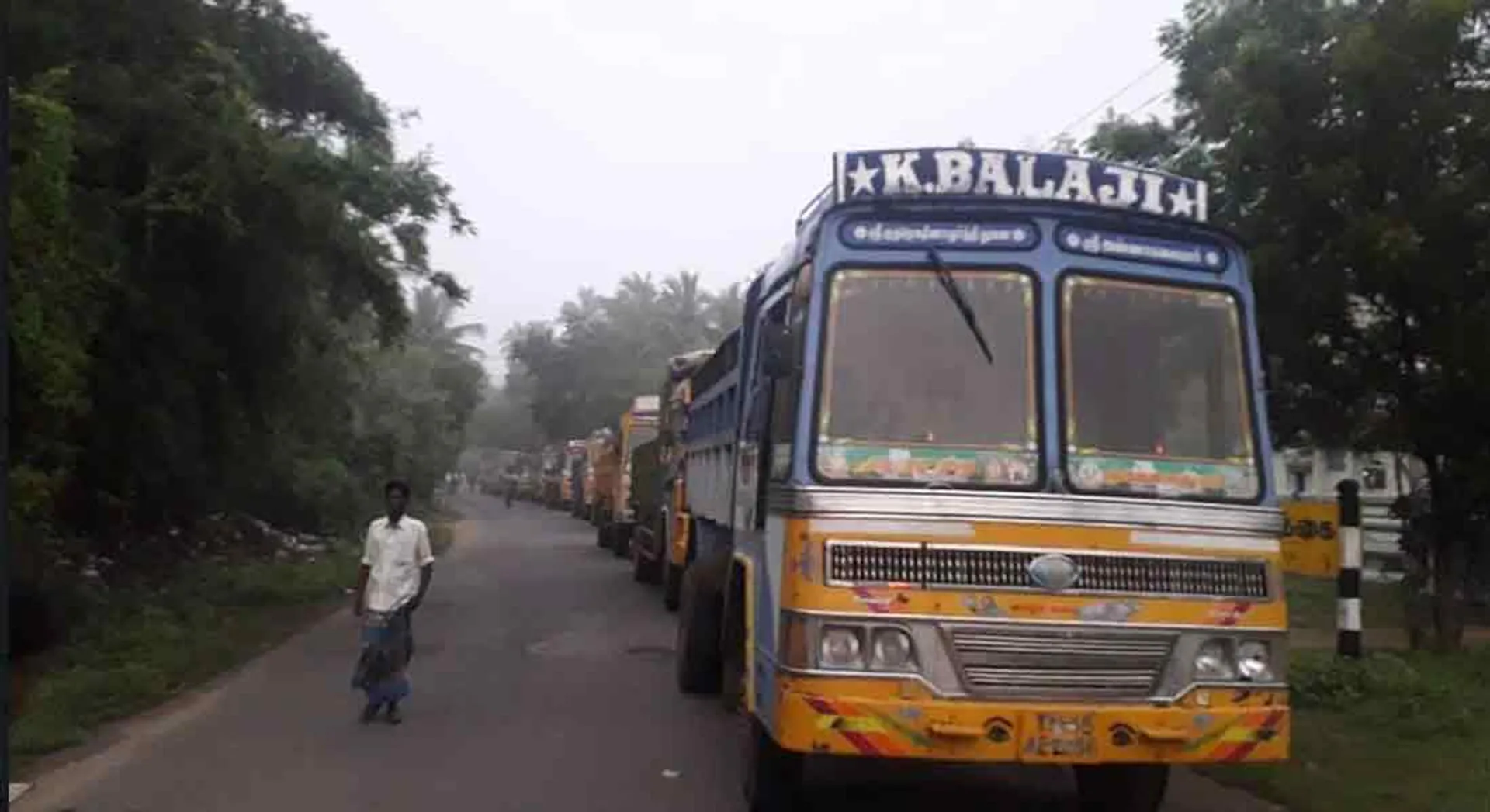 11 trucks carrying sand