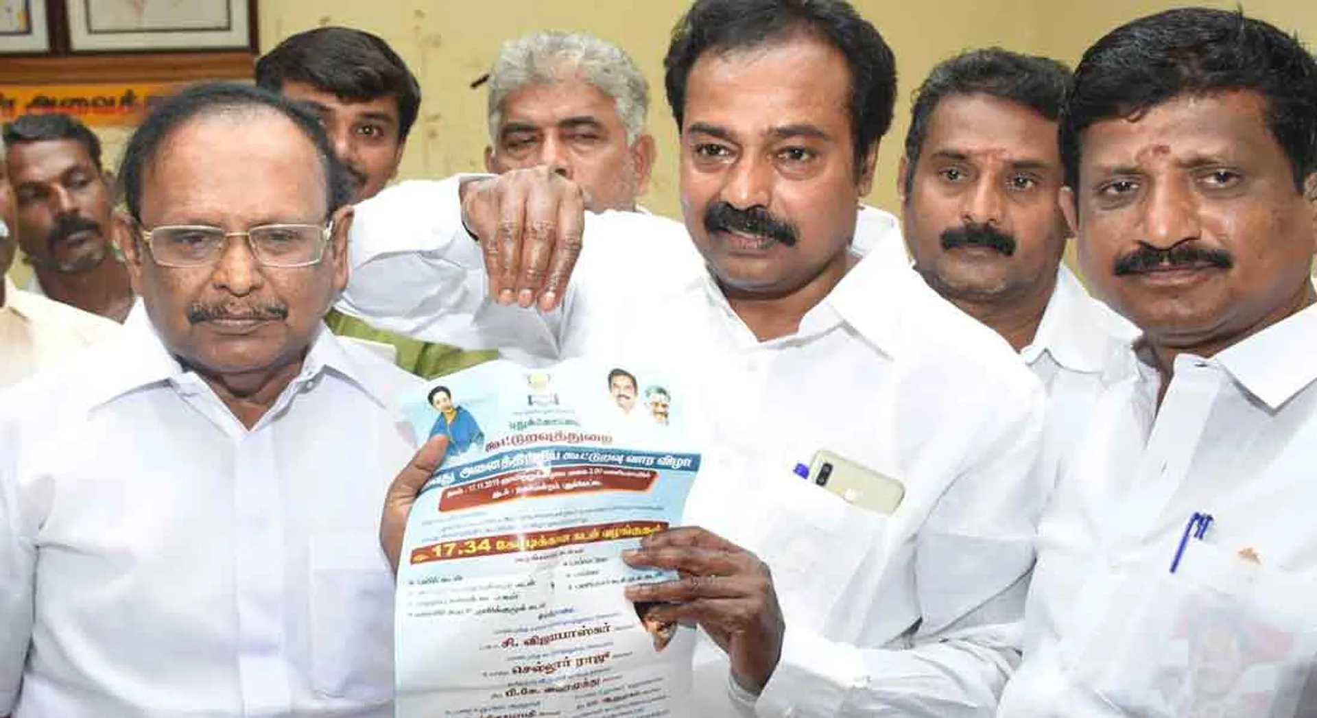 sues the for DMK slandering the District Collector