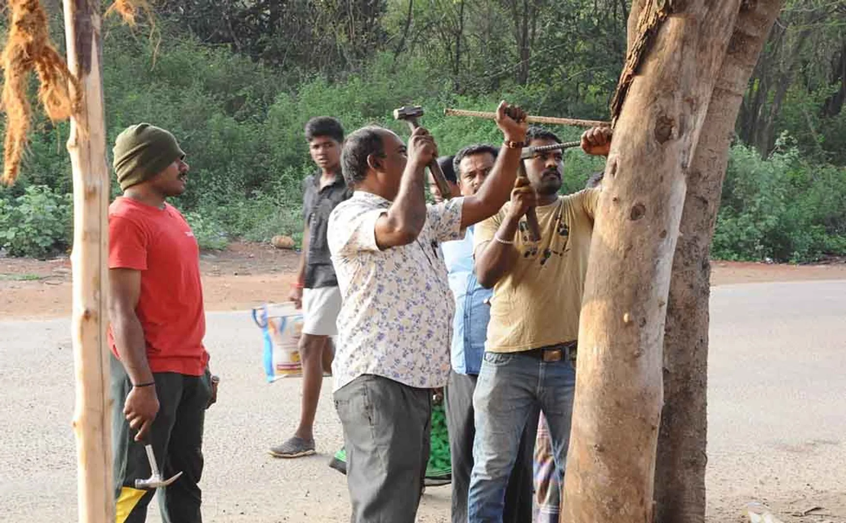 social Volunteers nail Pulling out festival theni district trees 
