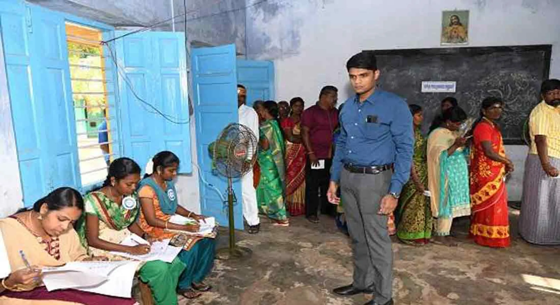 Election Officer. Woman cop suspended!