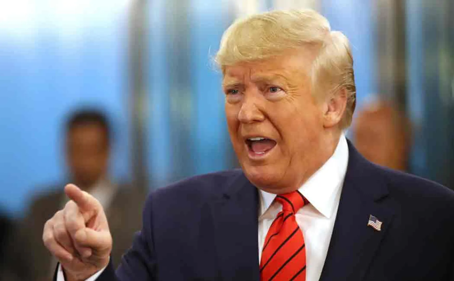 trump warns iraq on its stand of expelling usa troops