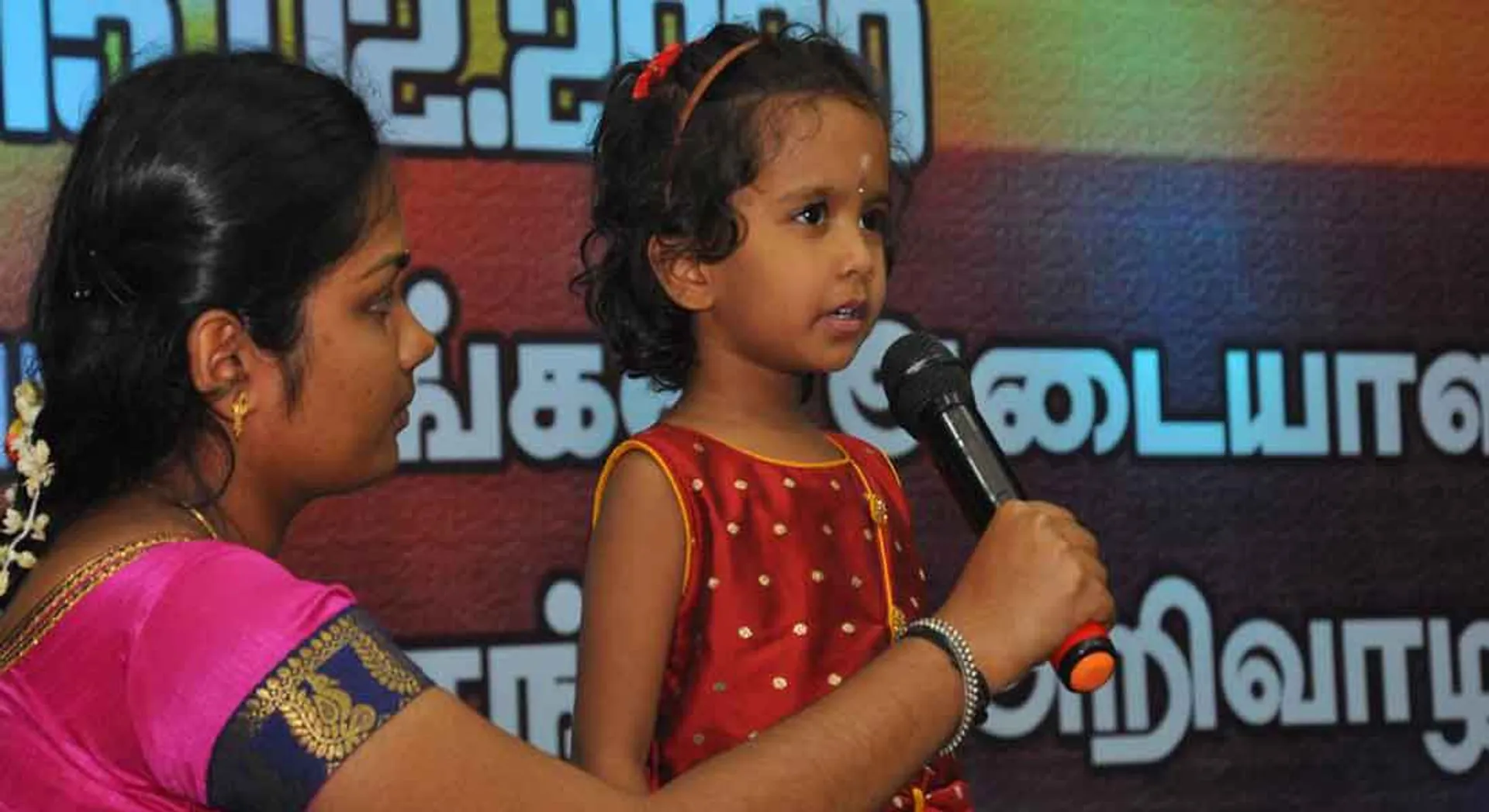 Tamil! At the age of three and a half Pranavi!