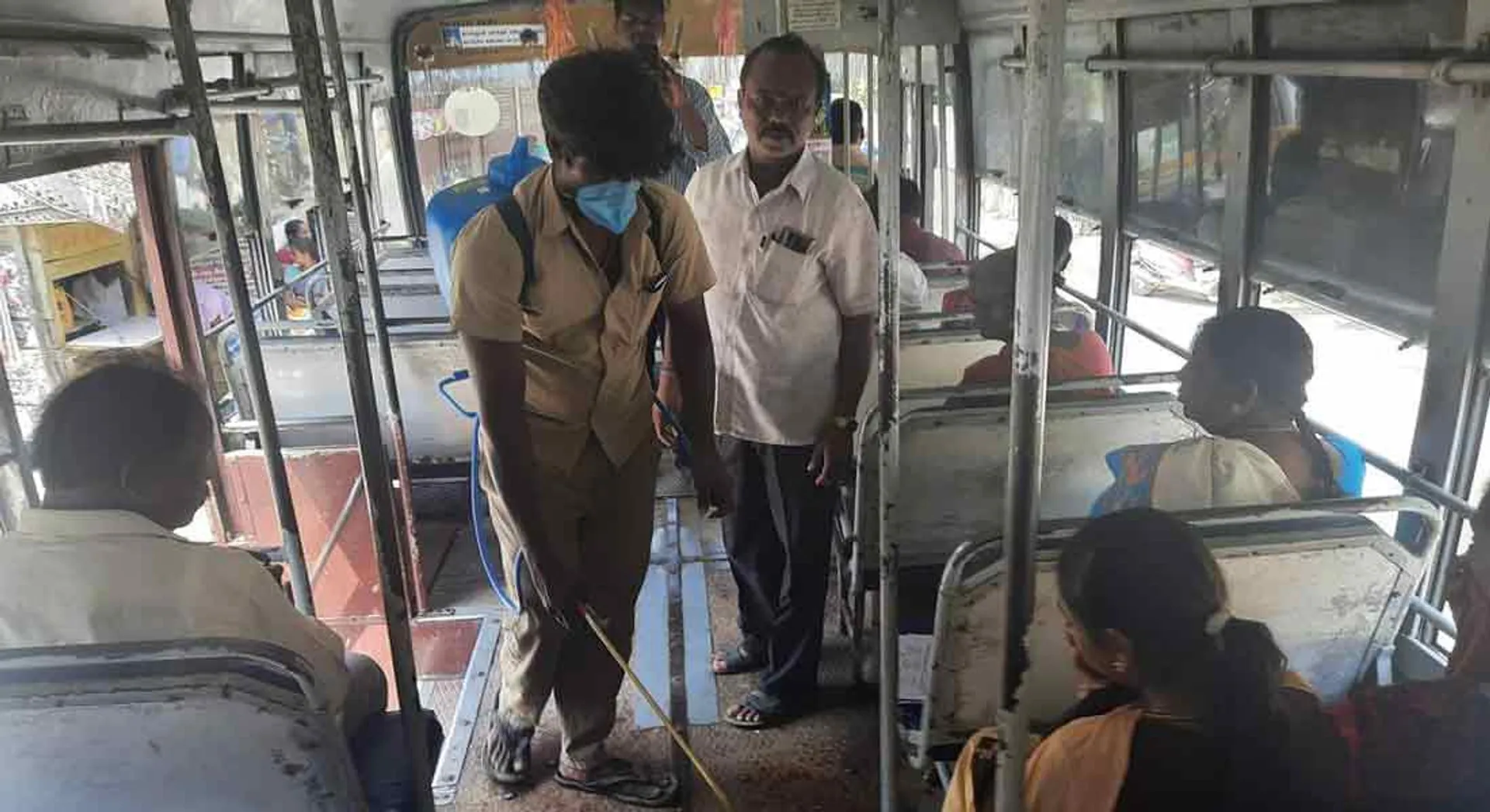  corona blocking ... Grimi nasini spray on buses at parangipettai