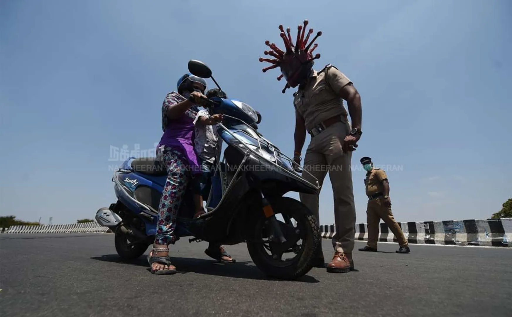 policeman wear corona helmet 