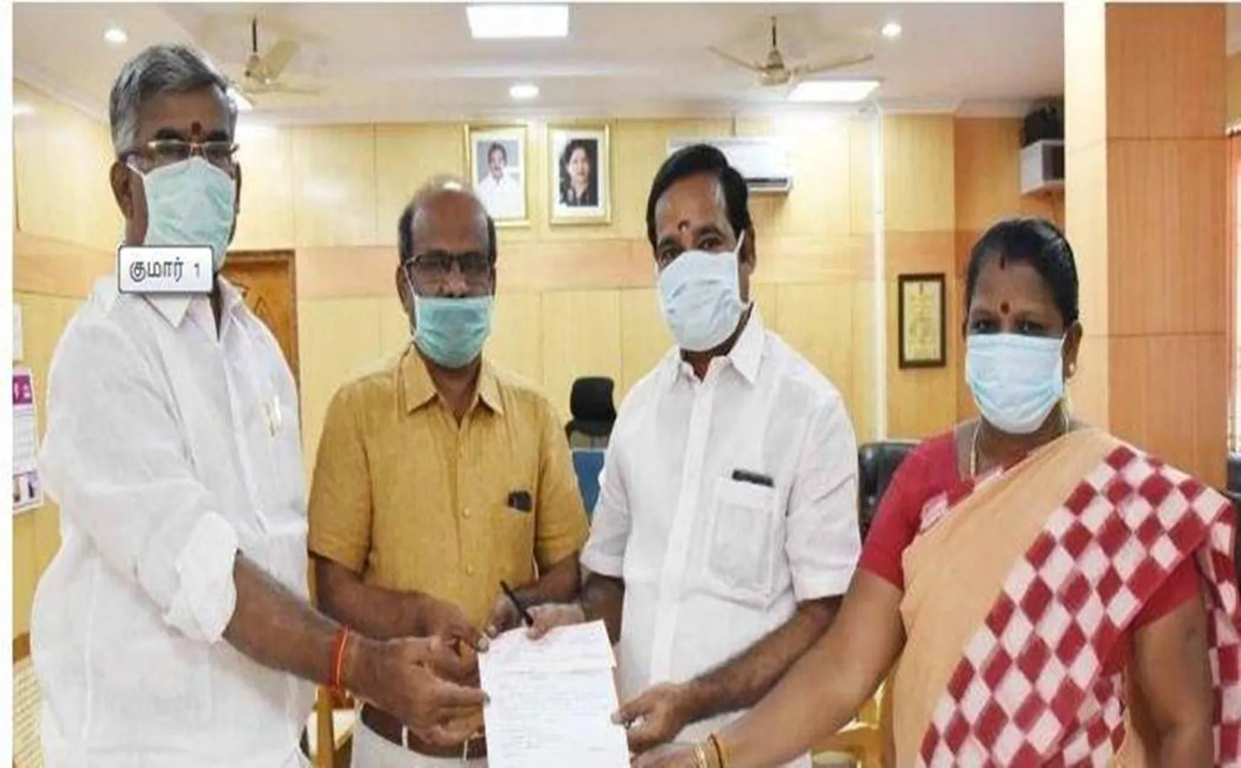 AIADMK District Secretary gave fund to  Corona impact 