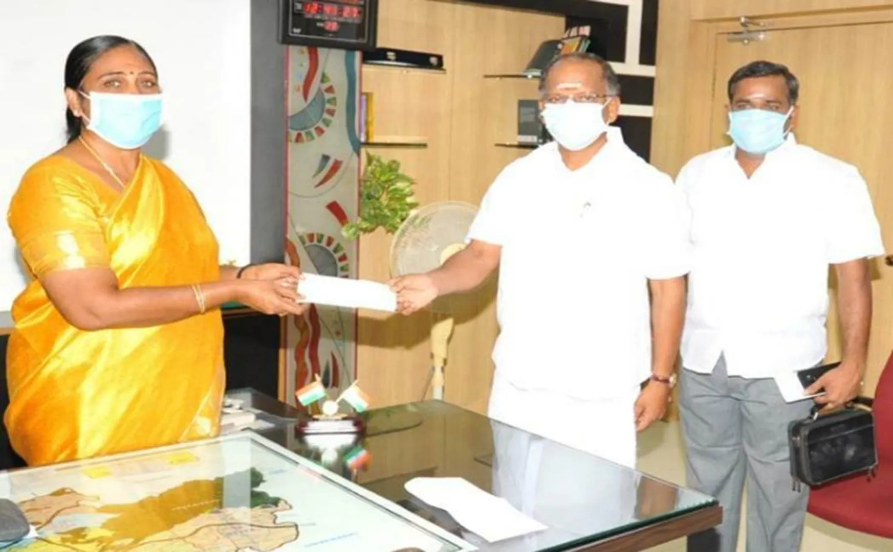  College secretary provided  Corona Relief fund to Dindigul Collector     