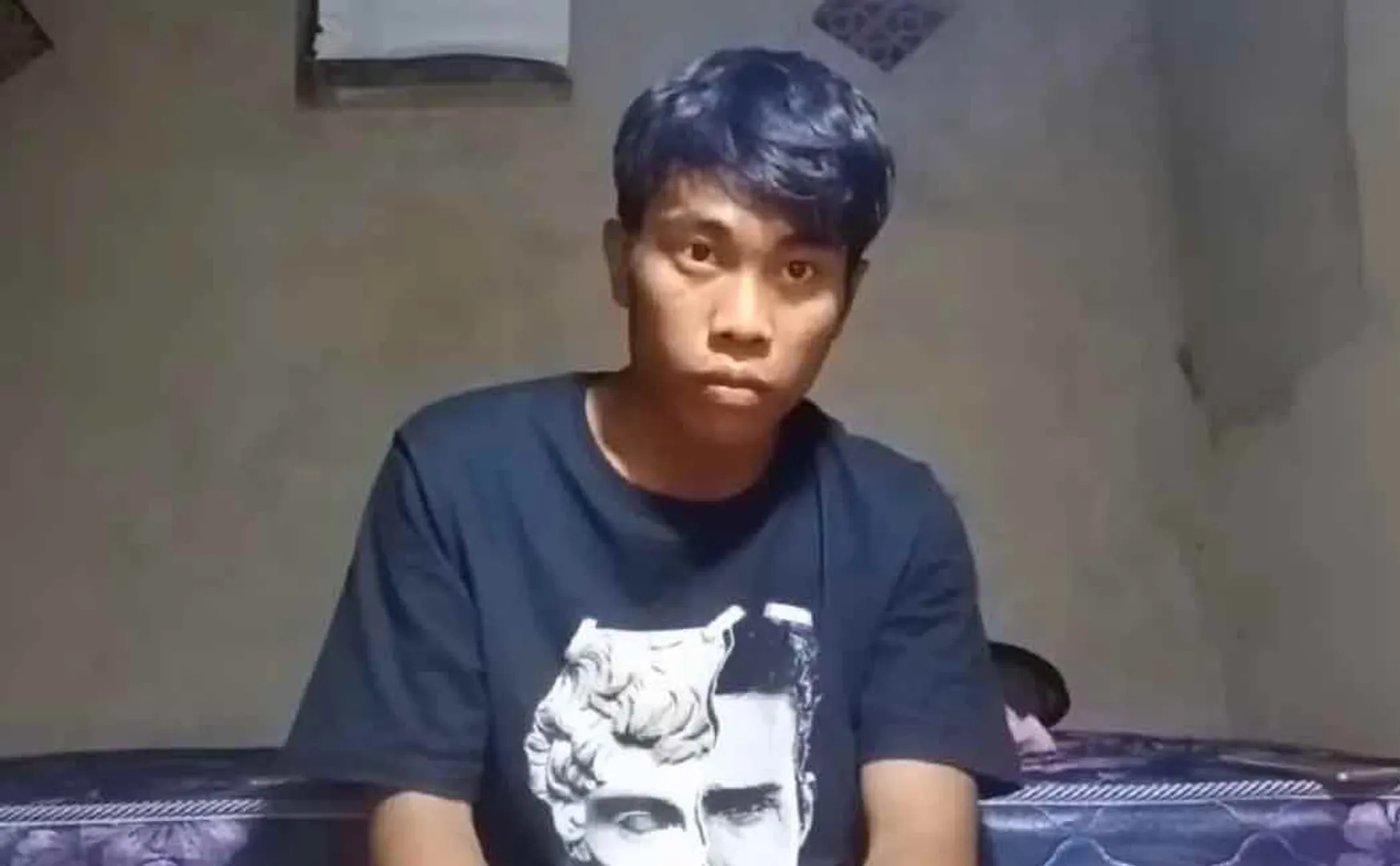 indonesian youth sitting ideal infront of camera for 2 hours