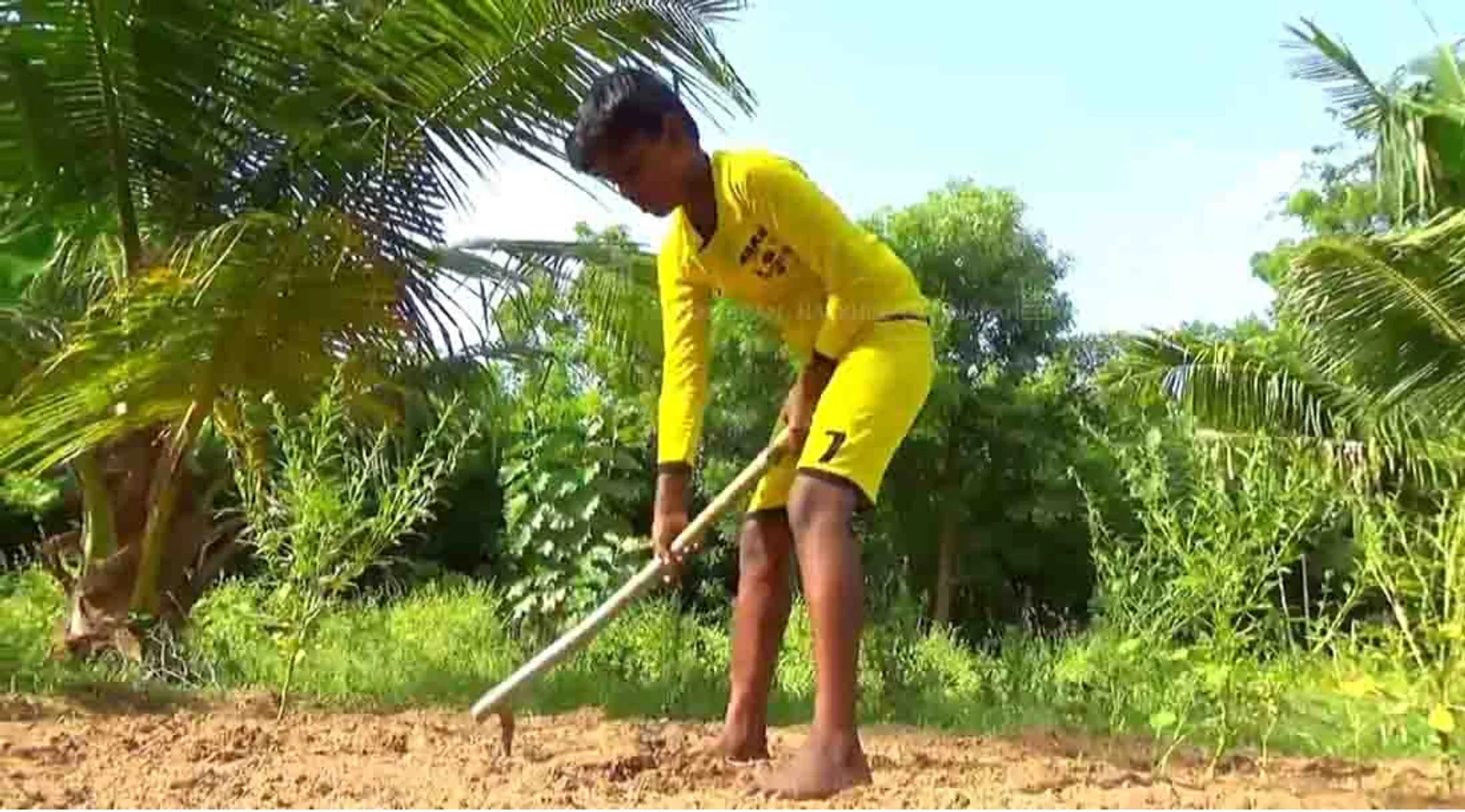  School boy in nature farming - Mannargudi