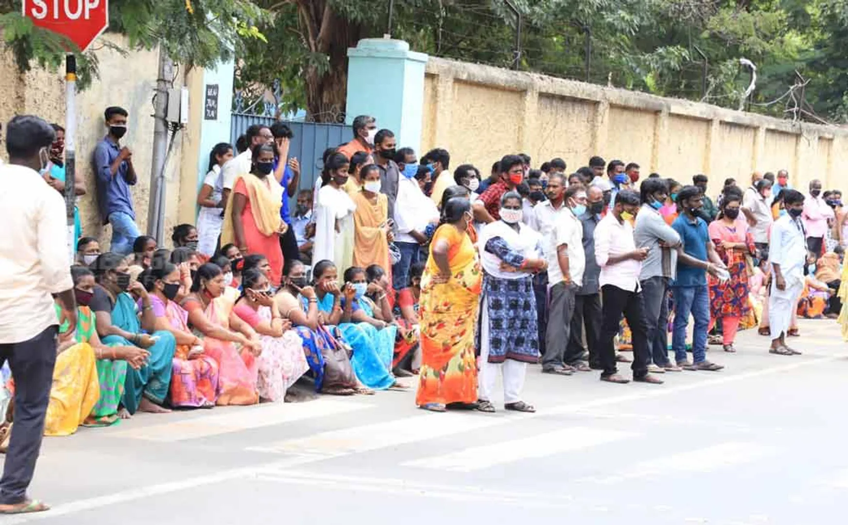 Students and parents waiting for college admission 