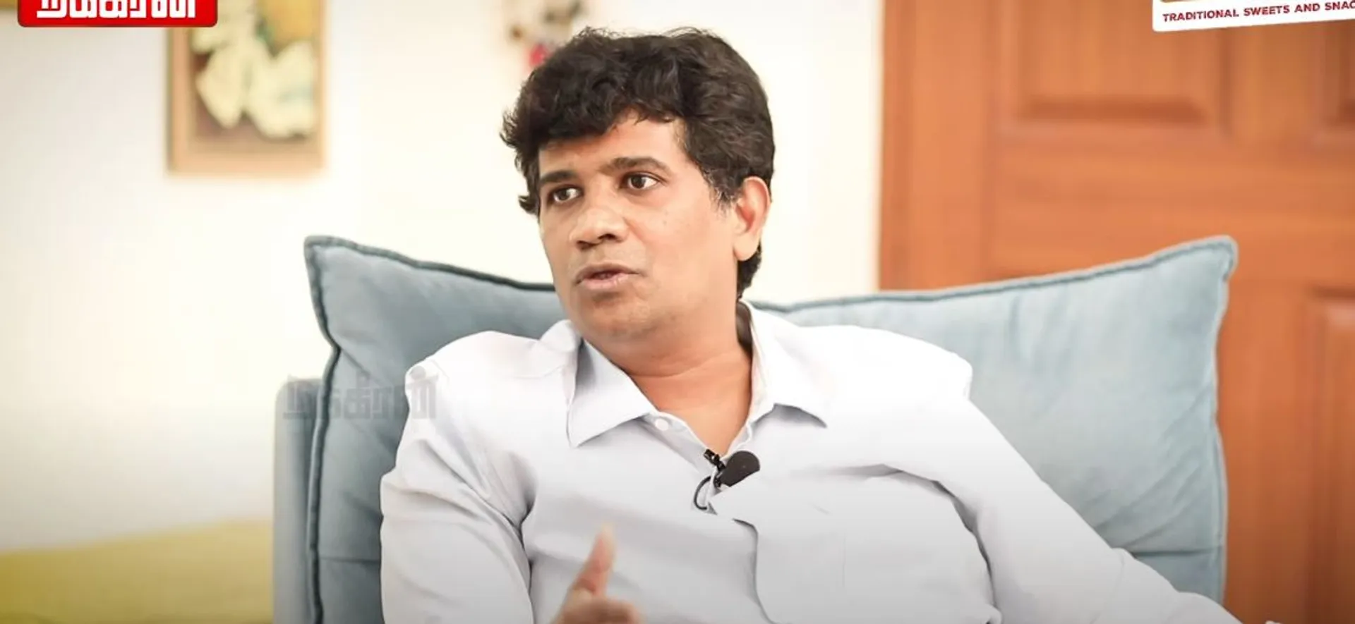 Dr. Ezhilan