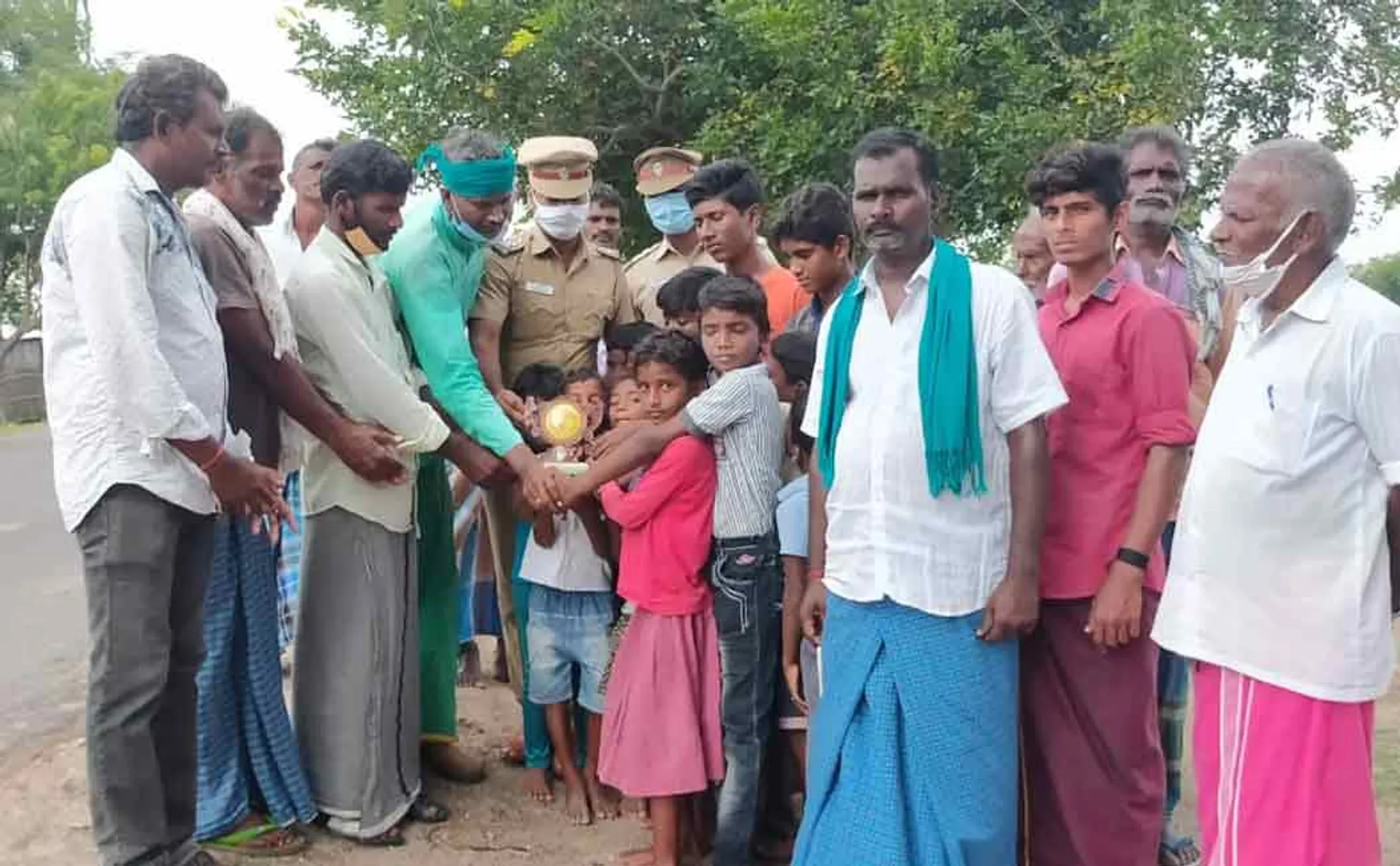 Village youth greening the arid village with trees ...! Honored Police ...!