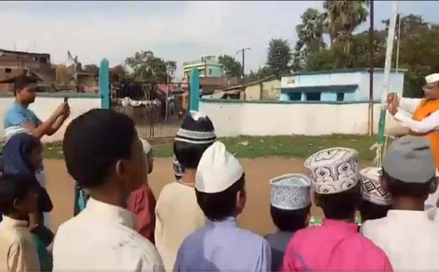 rjd shares video of bihar education minister struggle to sing national anthem