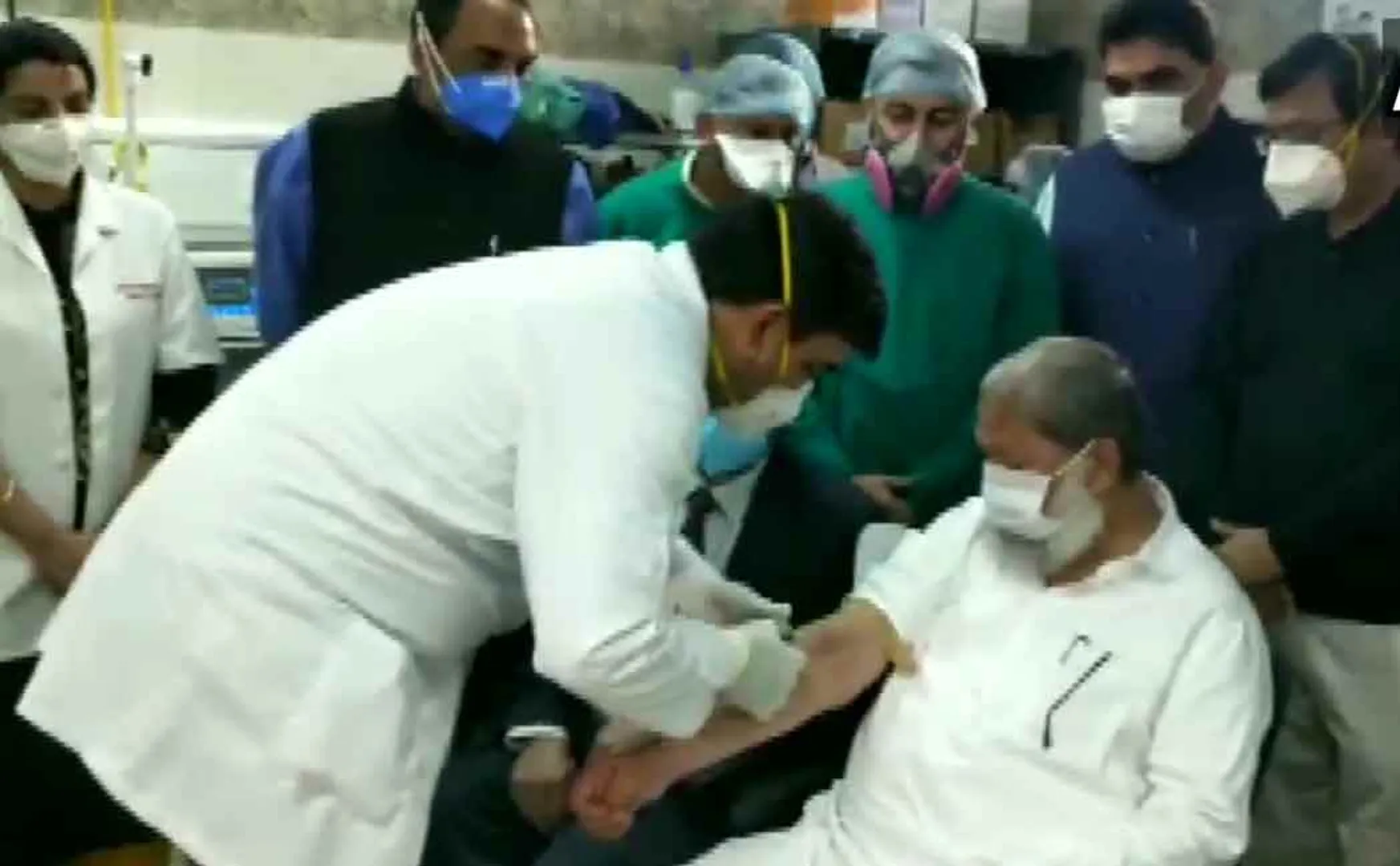 Haryana Health Minister Anil Vij being administered a trial dose of  covaxin