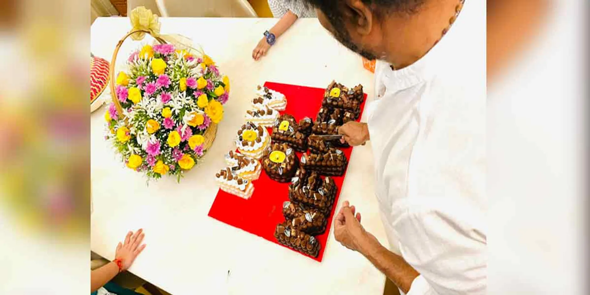  'Now or Never' - Rajinikanth cuts the cake!