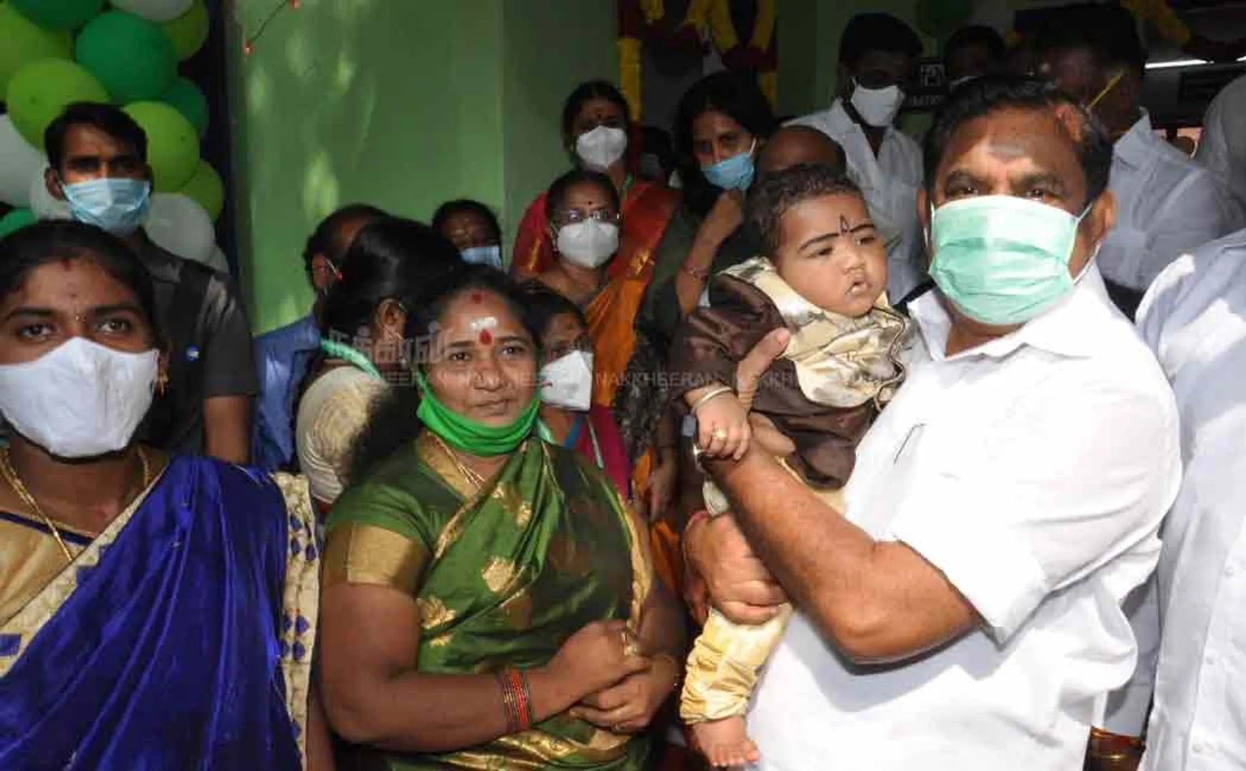 Chief Minister Palanisamy  child while mini clinic opening 