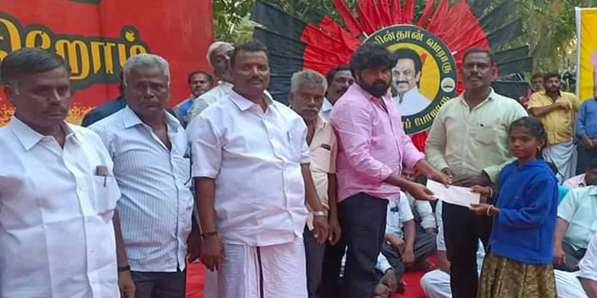  DMK helps girl in Grama meeting