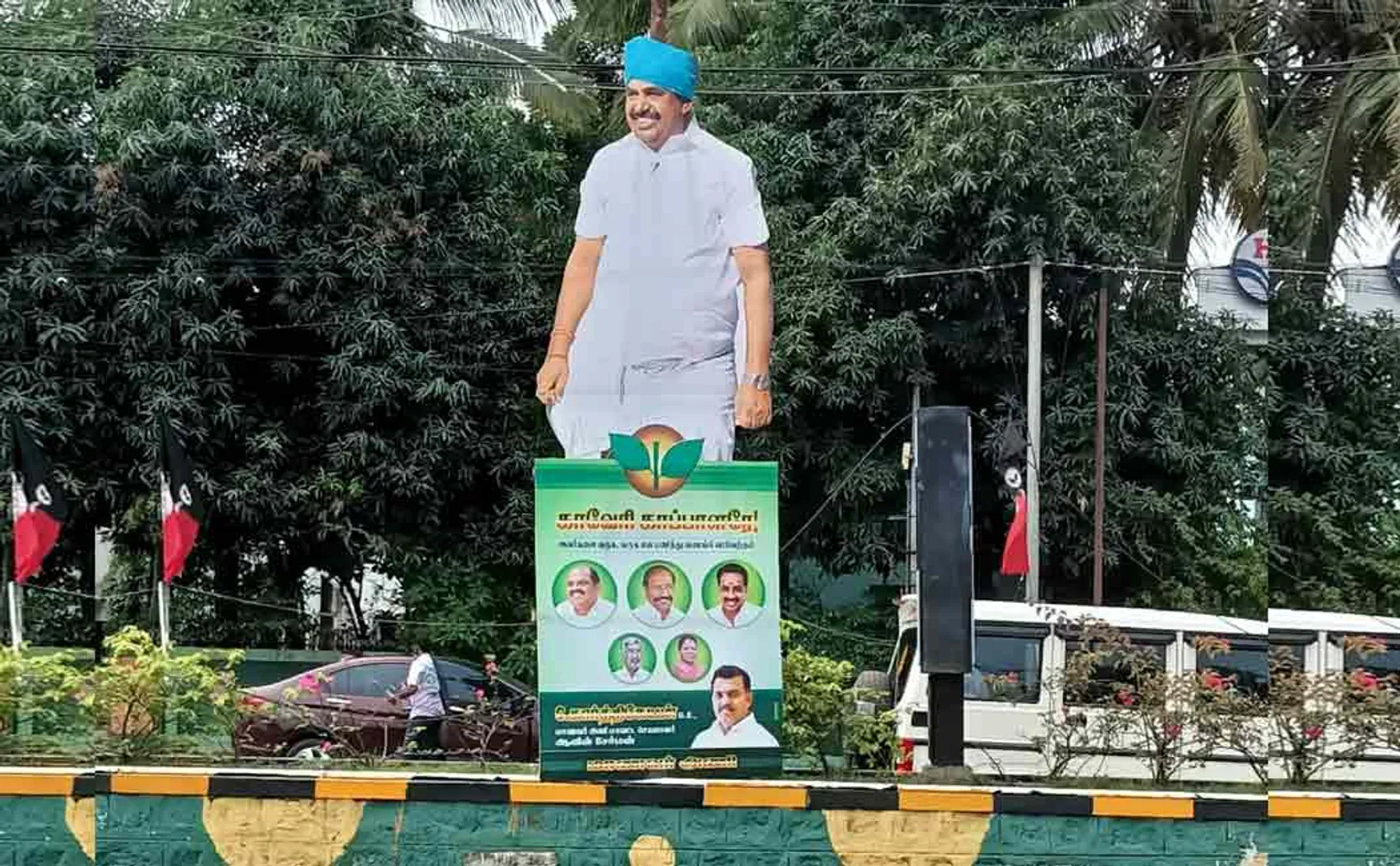 pictures  of Jayalalithaa, O.P.S. Palanisamy's banner