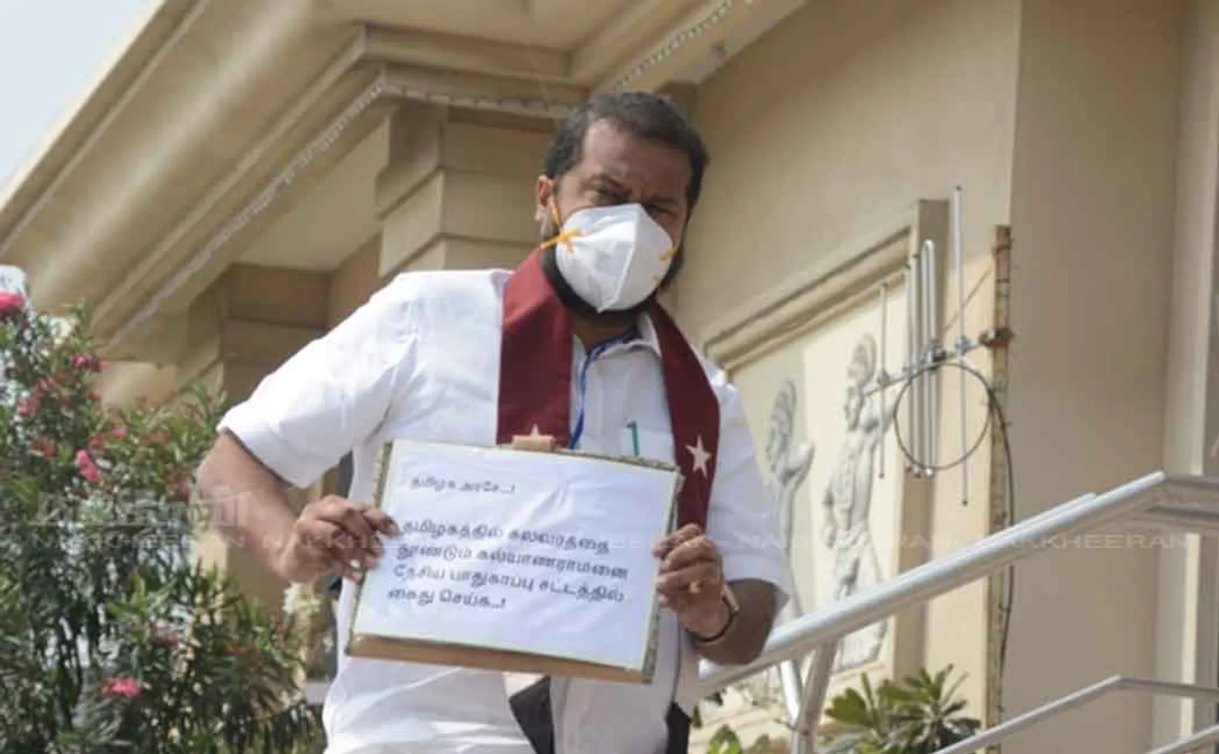 Tamimun Ansari who came with the banner ‘Kalyanaraman should be arrested under the National Security Act ..’