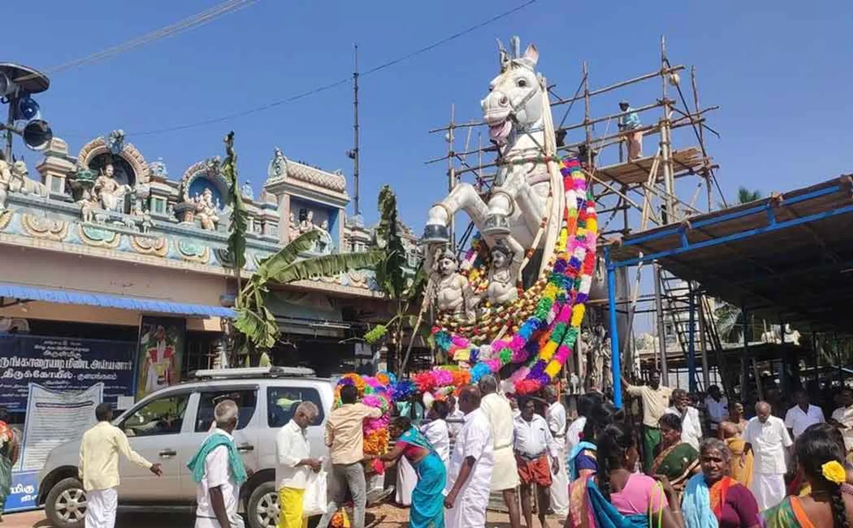 Masimagam Festival Paper flower garlands pile up for the huge horse statue 