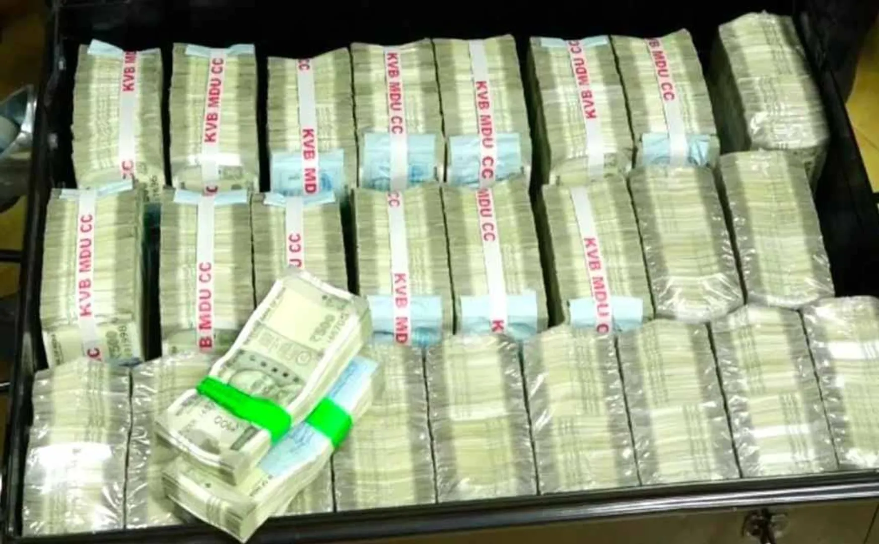 election squad officers checking seizures money 