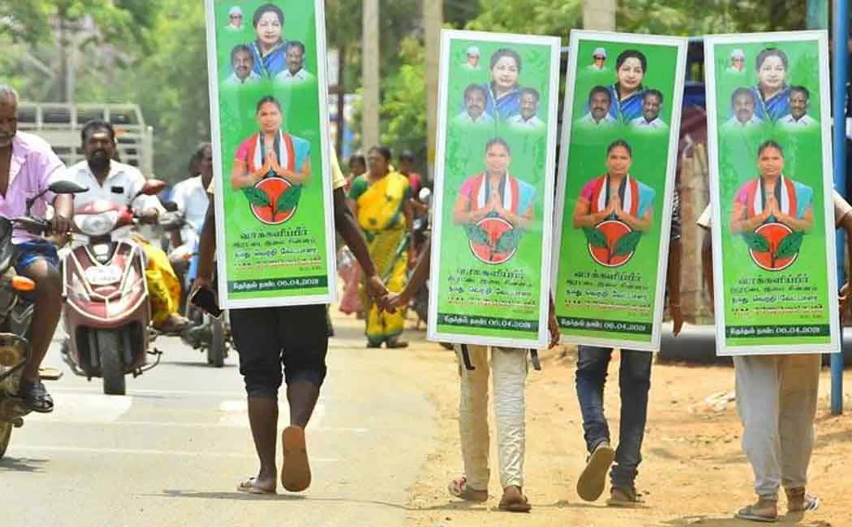 Boys carrying election boards ..!
