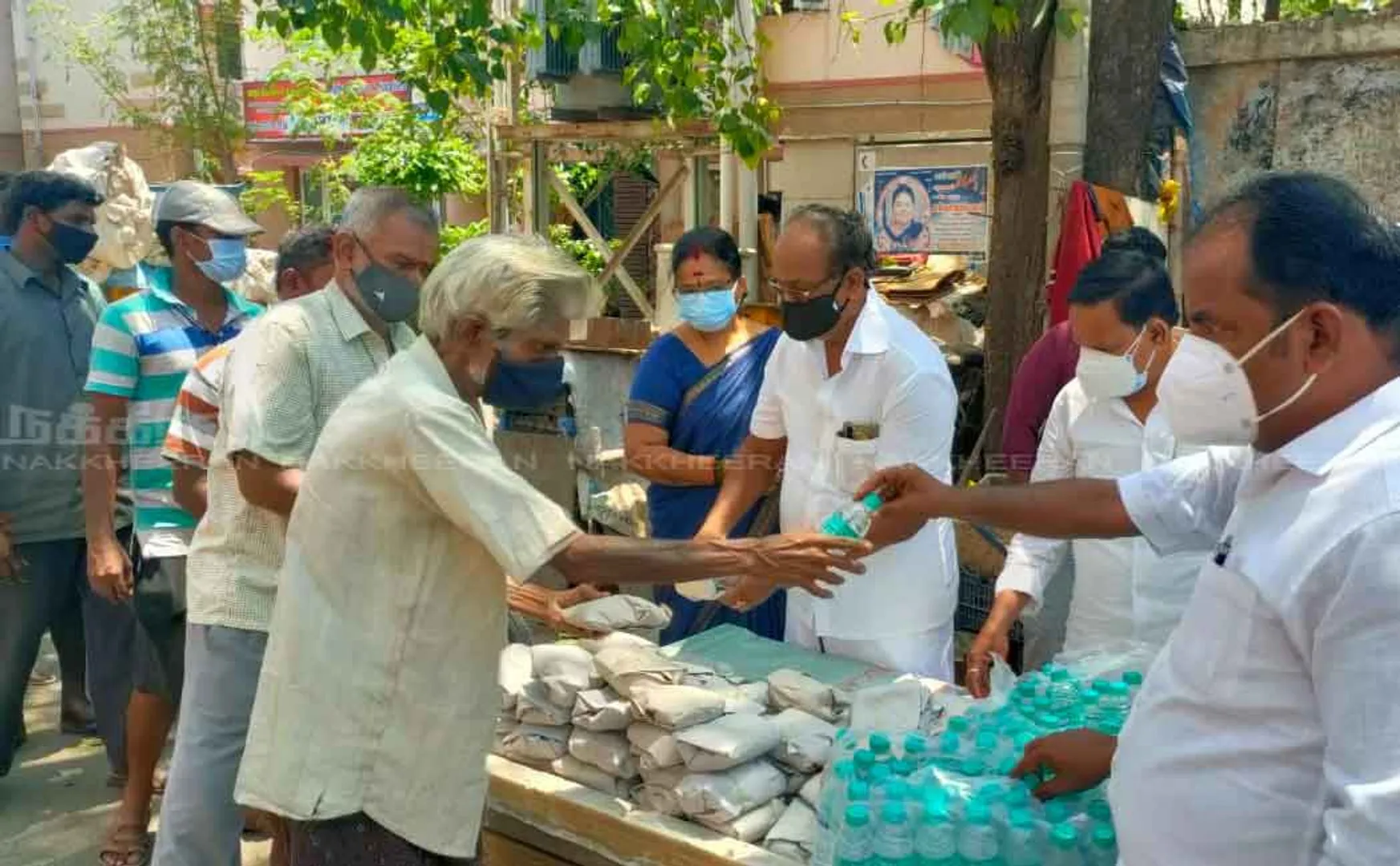 political involved members delivering food parcels