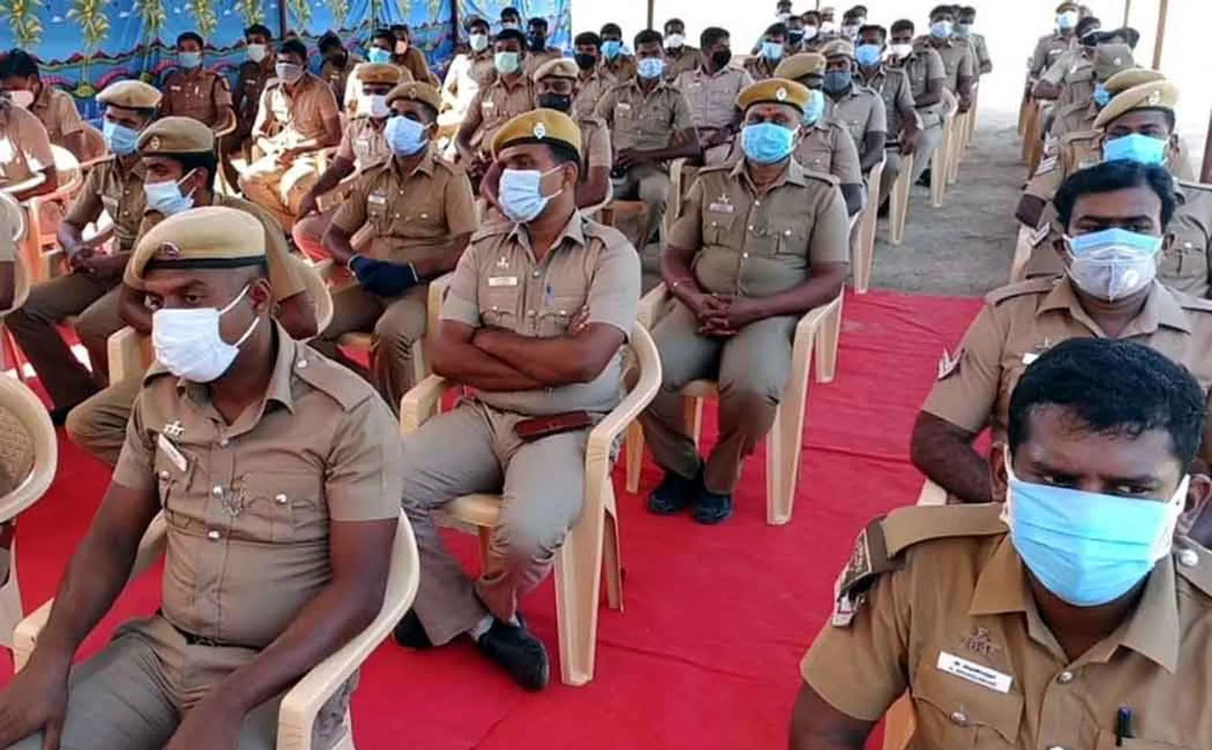Minister Muthusamy who provided welfare assistance to the police
