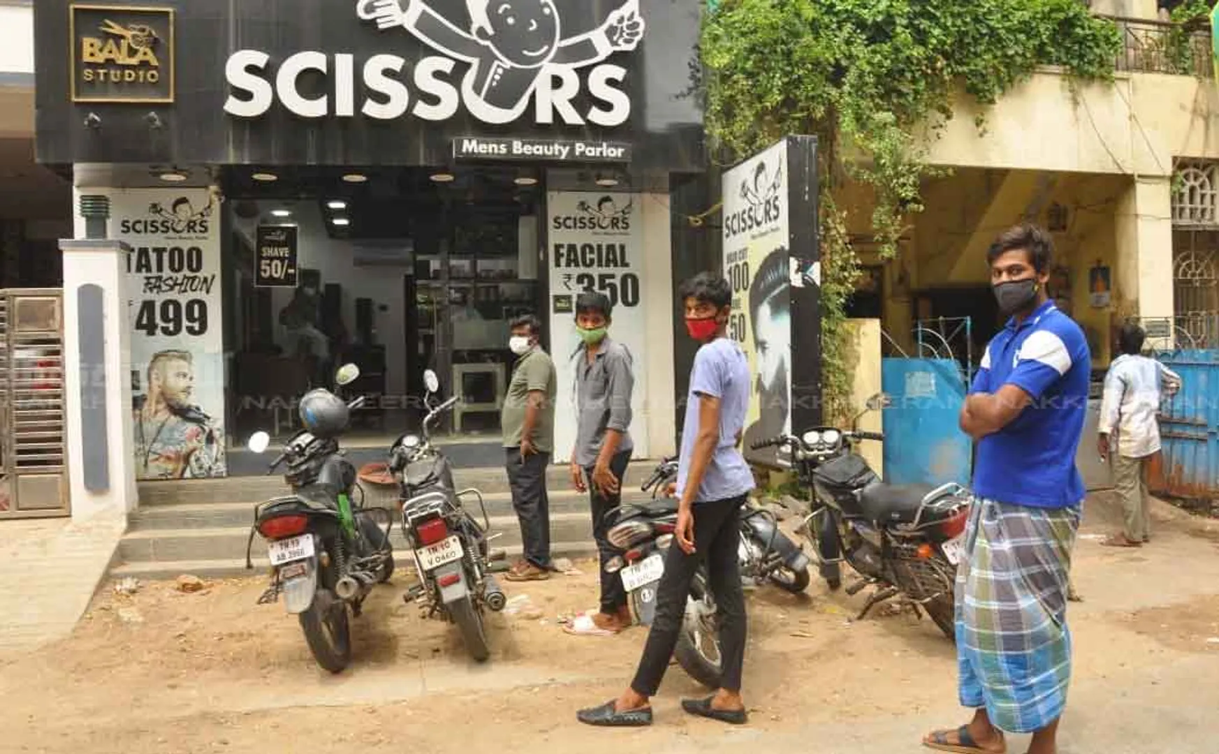 Young people standing in line at hairdressers 