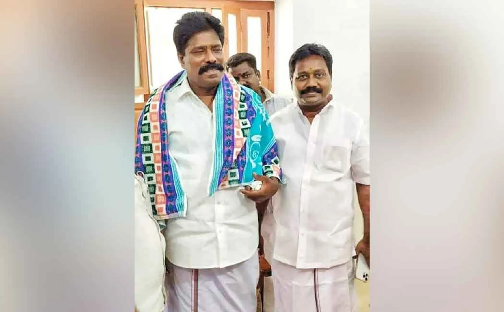 Former Union Secretary feeds cake to Central District Secretary... tough debate happen between two teams