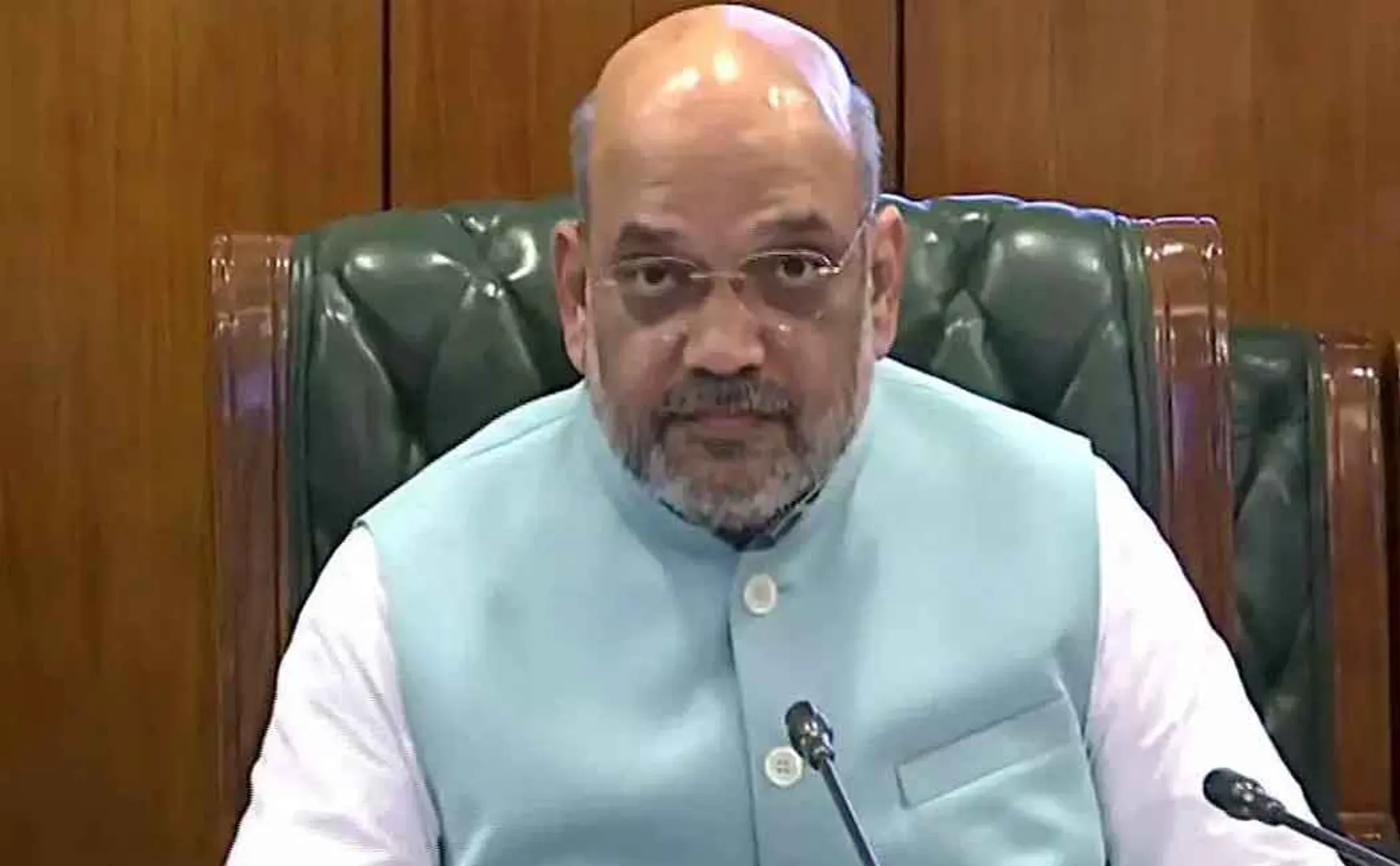 AMIT SHAH